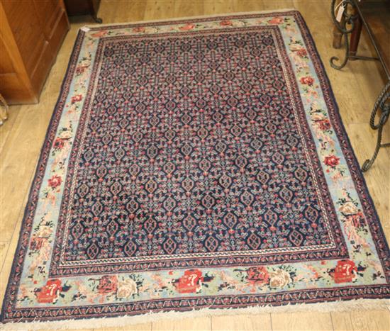 A Caucasian blue ground rug 200 x 140cm